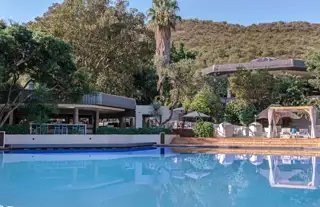 The Cabanas Hotel pool and tropical gardens